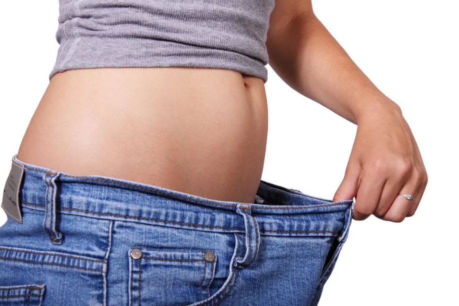 a person with a flat belly
